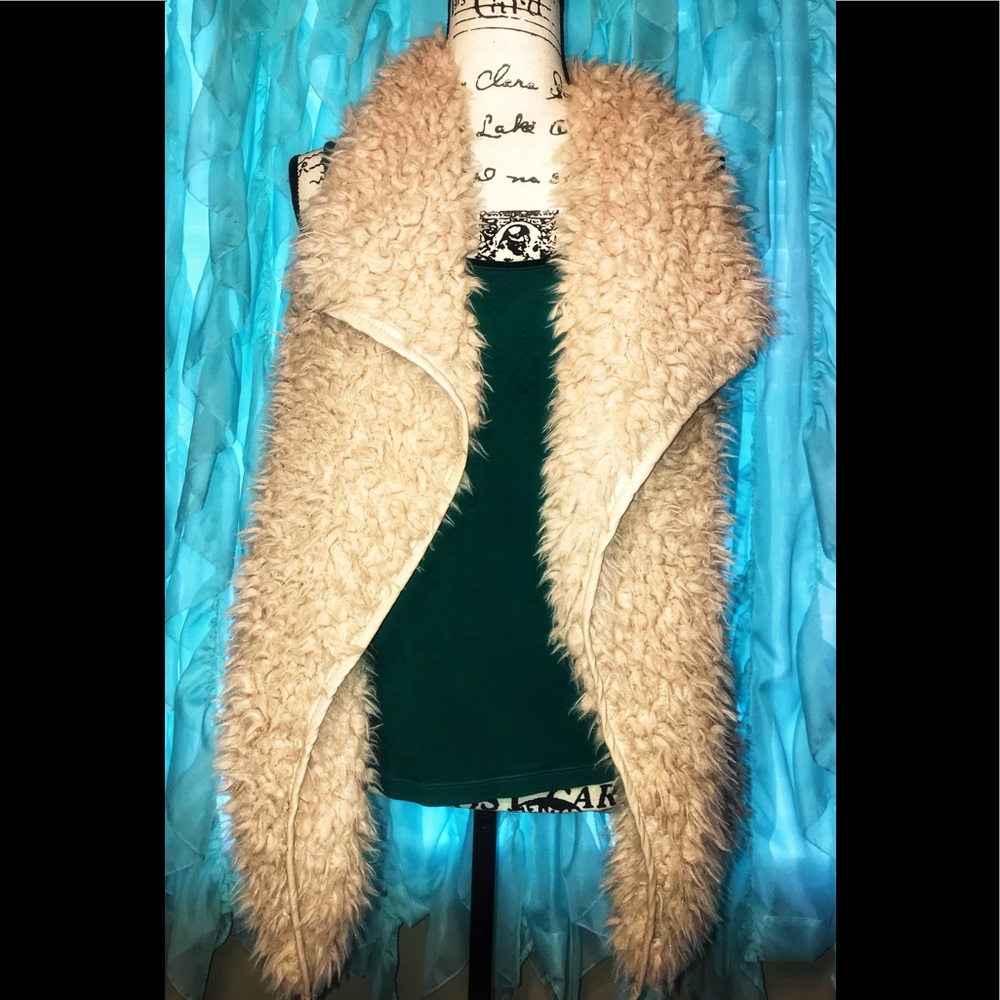 Cream colored shaggy vest